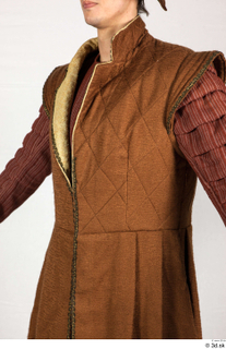  Photos Medieval Servant in suit 5 17th century Historical clothing Historical servant brown jacket red gambeson upper body 0002.jpg
